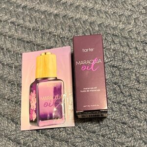 Tarte Maracuja Oil with Purple Bottle and Gold Cap